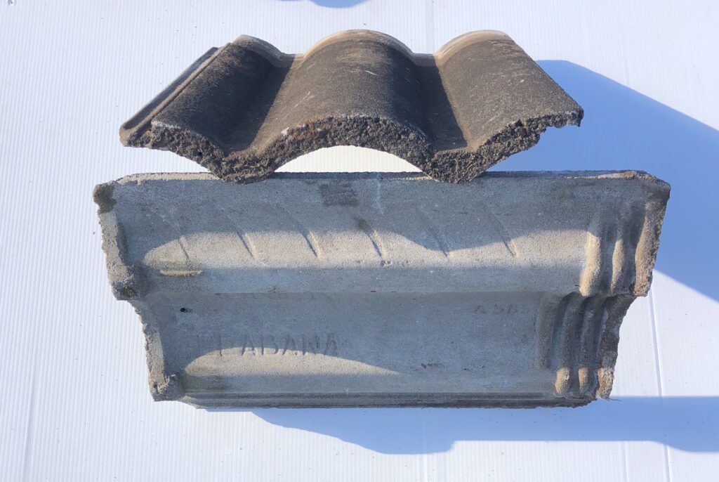 Second-hand Monier Elabana concrete roof tiles, a common profile priced below new