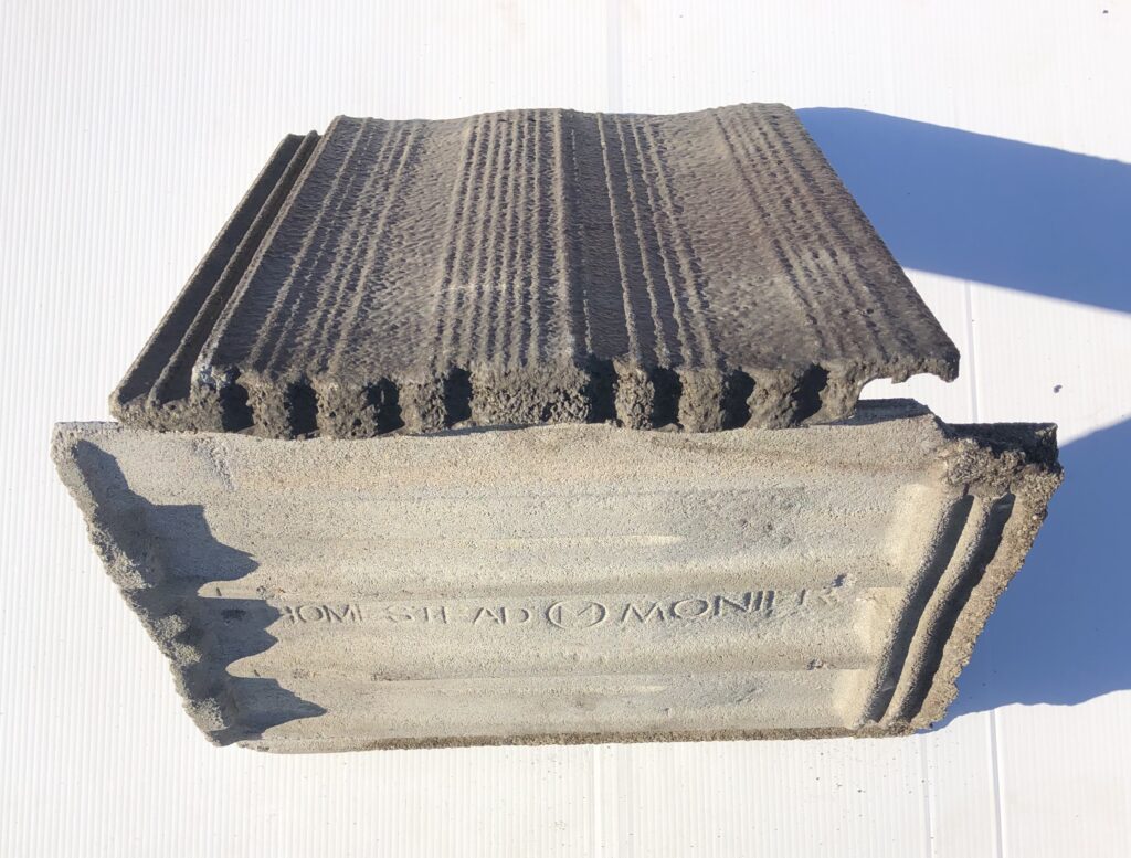 Second-hand Monier Homestead concrete roof tiles, a discontinued profile priced above common stock